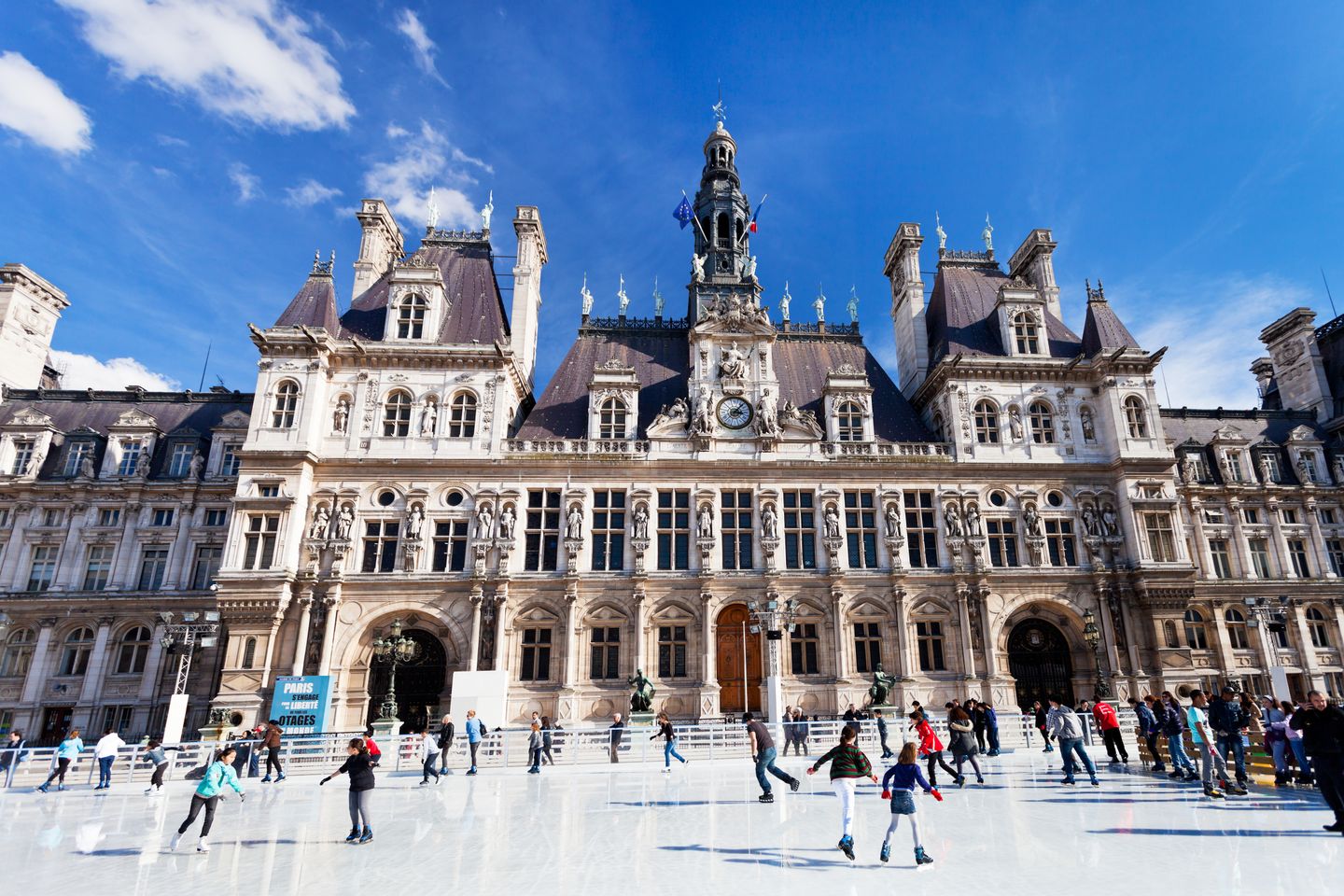 Christmas in Paris: Food, lights and festive activities Skating at the Hotel de Ville ice rink outside the City Hall in Paris